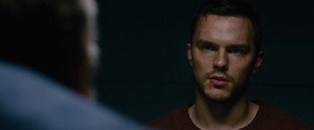 Movie still from “Collide” (2016), directed by Eran Creevy – A person looking at the camera; Close Up shot, Over the shoulder angle