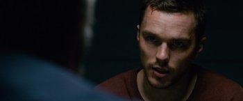 Movie still from “Collide” (2016), directed by Eran Creevy – A person looking at the camera; Close Up shot, Over the shoulder angle