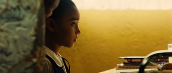 Movie still from “Colombiana” (2011), directed by Olivier Megaton – A young girl is sitting in front of a mirror; Close Up shot, Over the shoulder angle