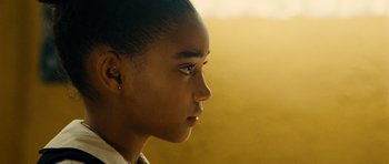 Movie still from “Colombiana” (2011), directed by Olivier Megaton – A person's face in a room; Close Up shot, Low angle