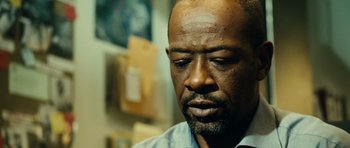 Movie still from “Colombiana” (2011), directed by Olivier Megaton – A man's face in a room; Close Up shot, Low angle
