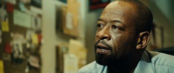 Movie still from “Colombiana” (2011), directed by Olivier Megaton – A person wearing a shirt; Close Up shot, Over the shoulder angle