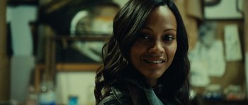 Movie still from “Colombiana” (2011), directed by Olivier Megaton – A person wearing a leather jacket; Close Up shot, Over the shoulder angle