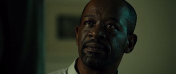 Movie still from “Colombiana” (2011), directed by Olivier Megaton – A person looking up at the sky; Close Up shot, Low angle