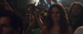 Movie still from “Colonia” (2015), directed by Florian Gallenberger – A group of young people sitting in a room; Close Up shot, Over the shoulder angle