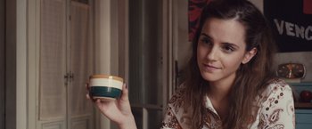 Movie still from “Colonia” (2015), directed by Florian Gallenberger – A woman is holding a bowl in her hand; Close Up shot, Over the shoulder angle