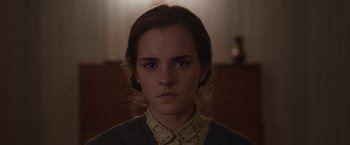 Movie still from “Colonia” (2015), directed by Florian Gallenberger – A person wearing a sweater; Close Up shot, Low angle