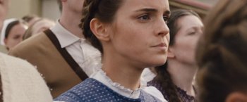 Movie still from “Colonia” (2015), directed by Florian Gallenberger – A person wearing a dress; Close Up shot, Low angle