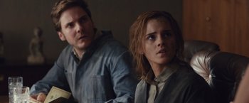Movie still from “Colonia” (2015), directed by Florian Gallenberger – A man and a woman are standing next to each other; Close Up shot, Over the shoulder angle