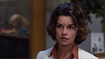 Movie still from “Coma” (1978), directed by Michael Crichton – A person with short hair; Close Up shot, Over the shoulder angle