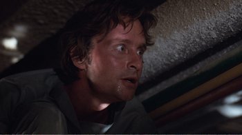 Movie still from “Coma” (1978), directed by Michael Crichton – A person looking up at the ceiling; Close Up shot, Low angle