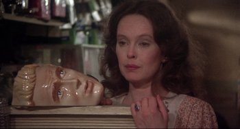 Movie still from “Come Back to the 5 & Dime Jimmy Dean, Jimmy Dean” (1982), directed by Robert Altman – A person with a mask; Close Up shot, Over the shoulder angle