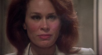 Movie still from “Come Back to the 5 & Dime Jimmy Dean, Jimmy Dean” (1982), directed by Robert Altman – A woman with red hair and green eyes; Close Up shot, Over the shoulder angle