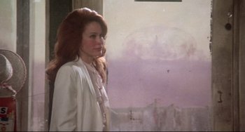 Movie still from “Come Back to the 5 & Dime Jimmy Dean, Jimmy Dean” (1982), directed by Robert Altman – A woman standing in front of a wall; Medium shot, Over the shoulder angle