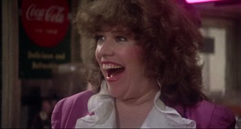 Movie still from “Come Back to the 5 & Dime Jimmy Dean, Jimmy Dean” (1982), directed by Robert Altman – A person wearing a wig; Close Up shot, Over the shoulder angle