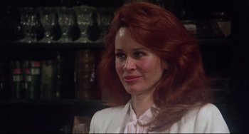 Movie still from “Come Back to the 5 & Dime Jimmy Dean, Jimmy Dean” (1982), directed by Robert Altman – A person with red hair; Close Up shot, Over the shoulder angle