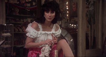 Movie still from “Come Back to the 5 & Dime Jimmy Dean, Jimmy Dean” (1982), directed by Robert Altman – A woman sitting on a chair in front of a mirror; Medium shot, Over the shoulder angle
