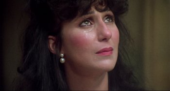 Movie still from “Come Back to the 5 & Dime Jimmy Dean, Jimmy Dean” (1982), directed by Robert Altman – A person with long black hair; Close Up shot, High angle