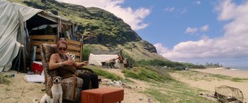 Movie still from “The Descendants” (2011), directed by Alexander Payne – A woman sitting on a chair on a hill; Wide shot, Over the shoulder angle