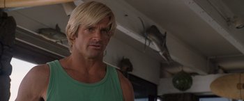 Movie still from “The Descendants” (2011), directed by Alexander Payne – A person wearing a green shirt; Close Up shot, Low angle