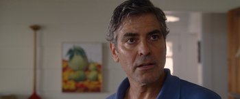 Movie still from “The Descendants” (2011), directed by Alexander Payne – A person looking at the camera; Close Up shot, Over the shoulder angle