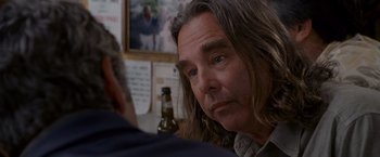 Movie still from “The Descendants” (2011), directed by Alexander Payne – A person with long hair; Close Up shot, Over the shoulder angle