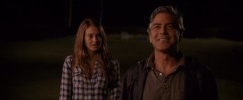 Movie still from “The Descendants” (2011), directed by Alexander Payne – A man and a woman standing next to each other; Close Up shot, Over the shoulder angle