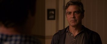 Movie still from “The Descendants” (2011), directed by Alexander Payne – A person wearing a shirt and jacket; Close Up shot, Over the shoulder angle
