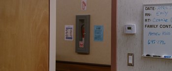 Movie still from “The Descendants” (2011), directed by Alexander Payne – A fire hydrant on the wall; Close Up shot, Over the shoulder angle