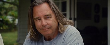 Movie still from “The Descendants” (2011), directed by Alexander Payne – A person with long hair; Close Up shot, Over the shoulder angle