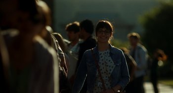 Movie still from “Comet” (2014), directed by Sam Esmail – A group of people standing in a crowd; Medium shot, Over the shoulder angle