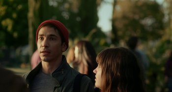 Movie still from “Comet” (2014), directed by Sam Esmail – A man and a woman standing next to each other; Close Up shot, Over the shoulder angle