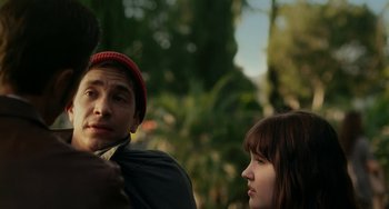 Movie still from “Comet” (2014), directed by Sam Esmail – A man and a woman standing next to each other; Close Up shot, Over the shoulder angle