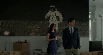 Movie still from “Comet” (2014), directed by Sam Esmail – A man and a woman standing next to each other; Medium shot, Low angle