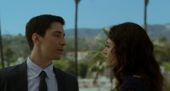 Movie still from “Comet” (2014), directed by Sam Esmail – A man and a woman standing next to each other; Close Up shot, Low angle