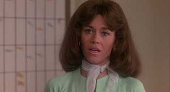 Movie still from “Coming Home” (1978), directed by Hal Ashby – A person wearing a green shirt; Close Up shot, Over the shoulder angle