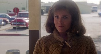 Movie still from “Coming Home” (1978), directed by Hal Ashby – A person wearing a coat; Close Up shot, Over the shoulder angle