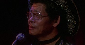 Movie still from “Coming Home” (1978), directed by Hal Ashby – An older man wearing glasses and wearing a crown; Close Up shot, Low angle