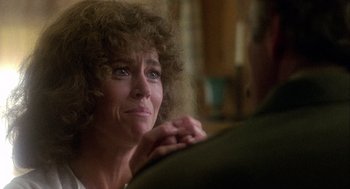 Movie still from “Coming Home” (1978), directed by Hal Ashby – An older woman is holding her hand on a man's shoulder; Close Up shot, Over the shoulder angle