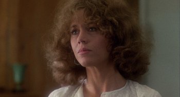 Movie still from “Coming Home” (1978), directed by Hal Ashby – A person with curly hair; Close Up shot, Low angle