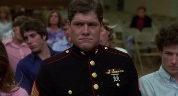 Movie still from “Coming Home” (1978), directed by Hal Ashby – A person wearing a military uniform; Close Up shot, Low angle