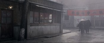 Movie still from “Coming Home” (2014), directed by Yimou Zhang – A building that has a lot of windows in it; Extreme Wide shot, High angle