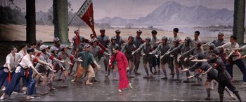 Movie still from “Coming Home” (2014), directed by Yimou Zhang – A group of men and women performing a dance; Extreme Wide shot, High angle