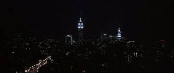 Movie still from “Communion” (1989), directed by Philippe Mora – A view of the empire state building at night; Extreme Wide shot, High angle