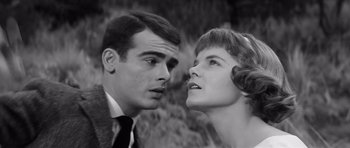 Movie still from “Compulsion” (1959), directed by Richard Fleischer – A man and a woman looking at each other in a black and white photo; Close Up shot, Low angle