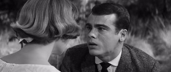 Movie still from “Compulsion” (1959), directed by Richard Fleischer – A man and a woman talking to each other; Close Up shot, Over the shoulder angle