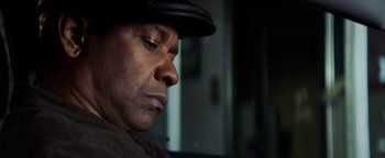 Movie still from “The Equalizer 2” (2018), directed by Antoine Fuqua – A person wearing a hat; Close Up shot, Low angle