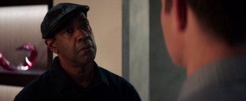 Movie still from “The Equalizer 2” (2018), directed by Antoine Fuqua – An older man looking at himself in the mirror; Close Up shot, Over the shoulder angle