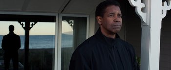 Movie still from “The Equalizer 2” (2018), directed by Antoine Fuqua – A person wearing a black jacket; Close Up shot, Low angle