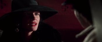 Movie still from “Confessions of a Dangerous Mind” (2002), directed by George Clooney – A person wearing a hat; Close Up shot, Low angle